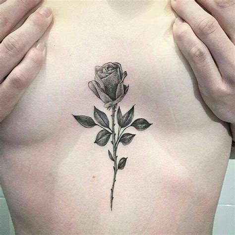 In between chest tattoo for women